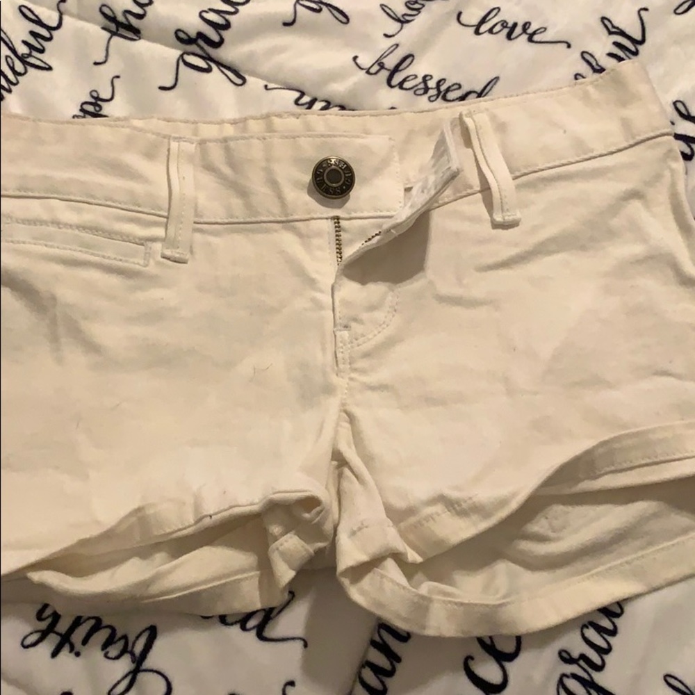 White guess shorts